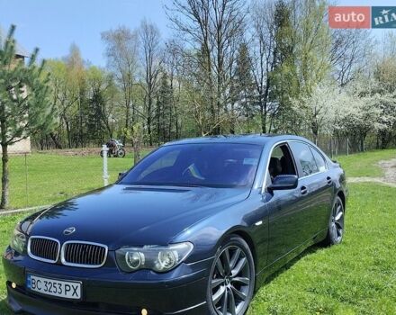 Синий БМВ 7 Серия, объемом двигателя 3 л и пробегом 300 тыс. км за 8000 $, фото 1 на Automoto.ua