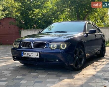 Синий БМВ 7 Серия, объемом двигателя 3 л и пробегом 582 тыс. км за 6900 $, фото 1 на Automoto.ua