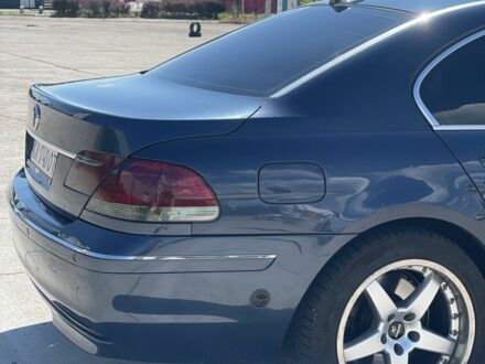 Синій БМВ 7 Серія, об'ємом двигуна 4 л та пробігом 389 тис. км за 6660 $, фото 1 на Automoto.ua