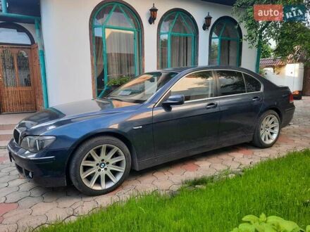 Синий БМВ 7 Серия, объемом двигателя 2.99 л и пробегом 304 тыс. км за 9500 $, фото 1 на Automoto.ua