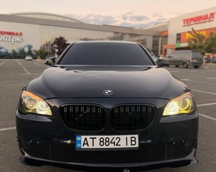 Синий БМВ 7 Серия, объемом двигателя 3 л и пробегом 303 тыс. км за 9000 $, фото 1 на Automoto.ua