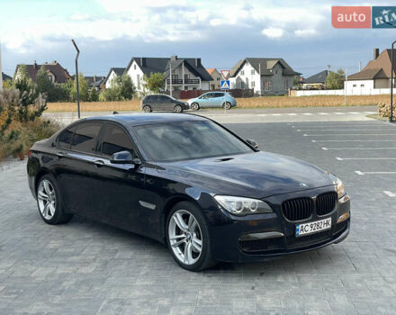 Синий БМВ 7 Серия, объемом двигателя 2.98 л и пробегом 190 тыс. км за 17800 $, фото 1 на Automoto.ua