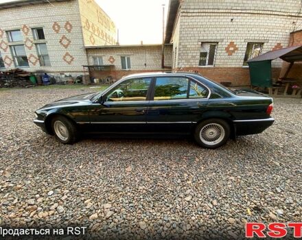 Зеленый БМВ 7 Серия, объемом двигателя 3.5 л и пробегом 694 тыс. км за 6500 $, фото 1 на Automoto.ua