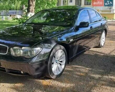 Зеленый БМВ 7 Серия, объемом двигателя 4.4 л и пробегом 380 тыс. км за 7500 $, фото 1 на Automoto.ua