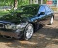 Зеленый БМВ 7 Серия, объемом двигателя 4.4 л и пробегом 380 тыс. км за 7500 $, фото 1 на Automoto.ua
