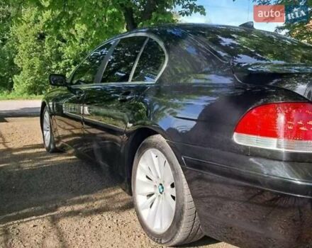 Зеленый БМВ 7 Серия, объемом двигателя 4.4 л и пробегом 380 тыс. км за 7500 $, фото 10 на Automoto.ua
