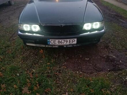 Зеленый БМВ 7 Серия, объемом двигателя 5.4 л и пробегом 517 тыс. км за 8000 $, фото 1 на Automoto.ua