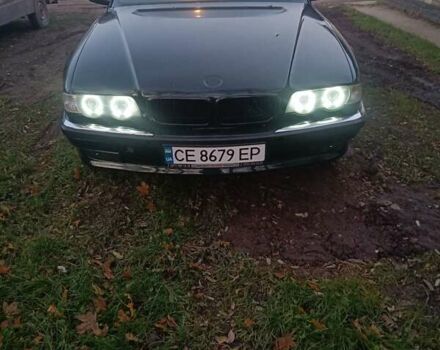 Зеленый БМВ 7 Серия, объемом двигателя 5.4 л и пробегом 517 тыс. км за 8000 $, фото 1 на Automoto.ua