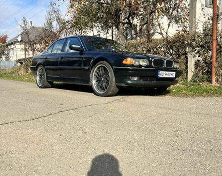 Зеленый БМВ 7 Серия, объемом двигателя 3 л и пробегом 450 тыс. км за 5700 $, фото 1 на Automoto.ua