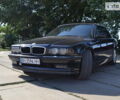 Черный БМВ 730, объемом двигателя 3 л и пробегом 300 тыс. км за 7800 $, фото 1 на Automoto.ua