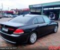 Черный БМВ 730, объемом двигателя 3 л и пробегом 430 тыс. км за 7000 $, фото 2 на Automoto.ua