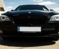 Чорний БМВ 730, об'ємом двигуна 3 л та пробігом 230 тис. км за 22000 $, фото 1 на Automoto.ua