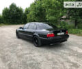 Черный БМВ 730, объемом двигателя 3 л и пробегом 327 тыс. км за 10700 $, фото 1 на Automoto.ua