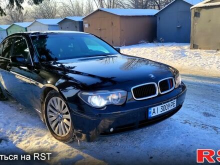 Черный БМВ 730, объемом двигателя 3 л и пробегом 430 тыс. км за 7000 $, фото 1 на Automoto.ua