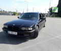 Чорний БМВ 735, об'ємом двигуна 3.5 л та пробігом 450 тис. км за 6200 $, фото 1 на Automoto.ua