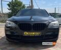 Чорний БМВ 740, об'ємом двигуна 3 л та пробігом 251 тис. км за 18500 $, фото 1 на Automoto.ua