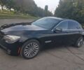 Чорний БМВ 740, об'ємом двигуна 3 л та пробігом 143 тис. км за 23400 $, фото 1 на Automoto.ua