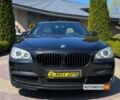 Чорний БМВ 740, об'ємом двигуна 3 л та пробігом 250 тис. км за 15400 $, фото 1 на Automoto.ua
