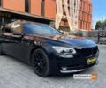 Чорний БМВ 740, об'ємом двигуна 3 л та пробігом 205 тис. км за 24800 $, фото 1 на Automoto.ua