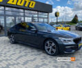 Чорний БМВ 740, об'ємом двигуна 3 л та пробігом 160 тис. км за 43500 $, фото 1 на Automoto.ua