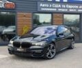 Черный БМВ 740, объемом двигателя 3 л и пробегом 156 тыс. км за 27000 $, фото 1 на Automoto.ua