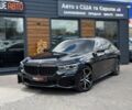 Чорний БМВ 740, об'ємом двигуна 3 л та пробігом 166 тис. км за 30999 $, фото 1 на Automoto.ua