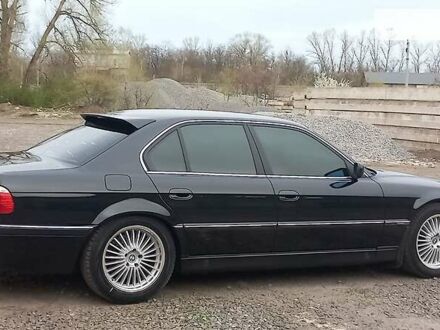 БМВ 740 1997 у Александрие на Automoto.ua Чорний БМВ 740, об'ємом двигуна 4.4 л та пробігом 338 тис. км за 7500 $, фото 1 на Automoto.ua