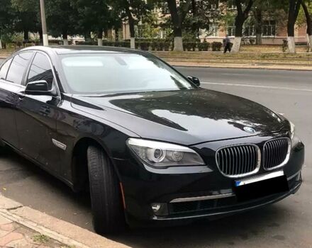 Чорний БМВ 740, об'ємом двигуна 4 л та пробігом 140 тис. км за 17000 $, фото 1 на Automoto.ua