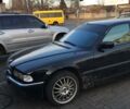 Серый БМВ 740, объемом двигателя 4 л и пробегом 300 тыс. км за 3000 $, фото 1 на Automoto.ua