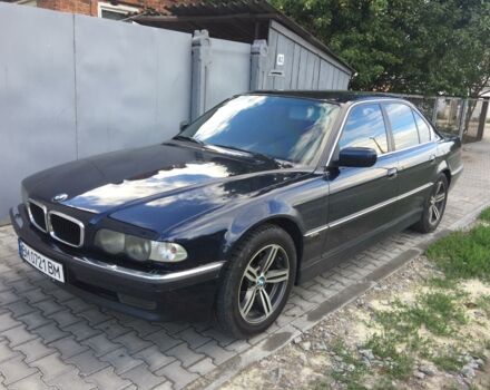 Синий БМВ 740, объемом двигателя 4 л и пробегом 190 тыс. км за 5950 $, фото 1 на Automoto.ua