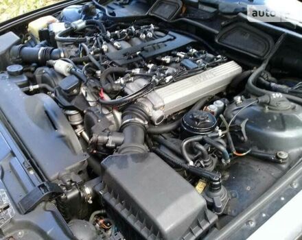 Черный БМВ 750, объемом двигателя 5.4 л и пробегом 450 тыс. км за 5750 $, фото 1 на Automoto.ua