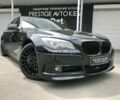 Черный БМВ 750, объемом двигателя 4.4 л и пробегом 127 тыс. км за 21500 $, фото 1 на Automoto.ua