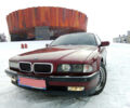 Червоний БМВ 750, об'ємом двигуна 5.4 л та пробігом 240 тис. км за 6500 $, фото 1 на Automoto.ua