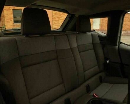 Красный БМВ И3, объемом двигателя 0.7 л и пробегом 35 тыс. км за 6400 $, фото 16 на Automoto.ua