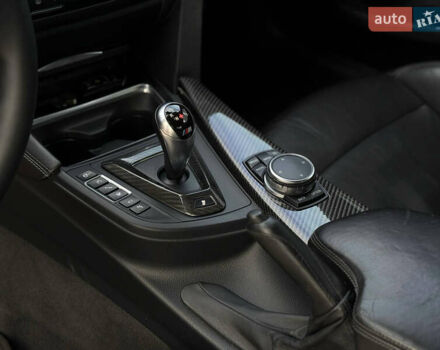 Черный БМВ M4, объемом двигателя 2.98 л и пробегом 140 тыс. км за 26900 $, фото 13 на Automoto.ua