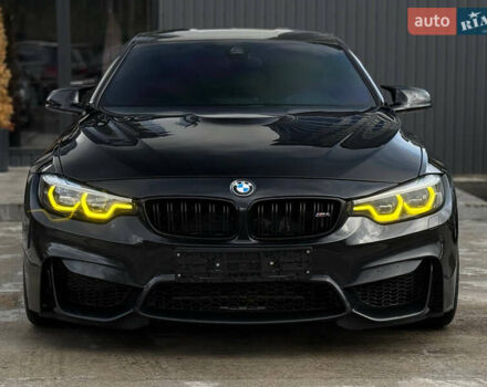Черный БМВ M4, объемом двигателя 2.98 л и пробегом 140 тыс. км за 26900 $, фото 1 на Automoto.ua