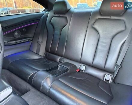 Черный БМВ M4, объемом двигателя 2.98 л и пробегом 148 тыс. км за 36990 $, фото 12 на Automoto.ua