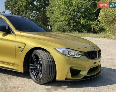 Желтый БМВ M4, объемом двигателя 2.98 л и пробегом 105 тыс. км за 44900 $, фото 4 на Automoto.ua