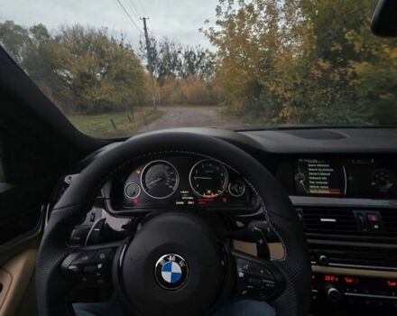 Чорний БМВ М5, об'ємом двигуна 2 л та пробігом 255 тис. км за 14021 $, фото 1 на Automoto.ua