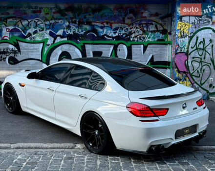 Белый БМВ М6, объемом двигателя 4.39 л и пробегом 90 тыс. км за 38900 $, фото 1 на Automoto.ua