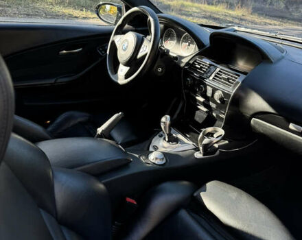 Черный БМВ М6, объемом двигателя 5 л и пробегом 125 тыс. км за 37500 $, фото 16 на Automoto.ua