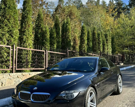 Черный БМВ М6, объемом двигателя 5 л и пробегом 125 тыс. км за 37500 $, фото 6 на Automoto.ua