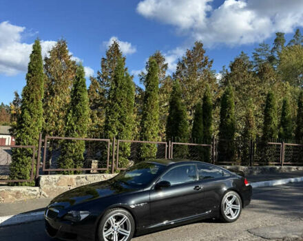 Черный БМВ М6, объемом двигателя 5 л и пробегом 125 тыс. км за 37500 $, фото 2 на Automoto.ua