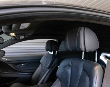 Черный БМВ М6, объемом двигателя 4.4 л и пробегом 77 тыс. км за 20500 $, фото 9 на Automoto.ua