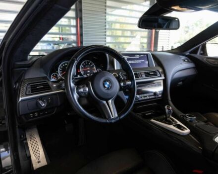 Черный БМВ М6, объемом двигателя 4.4 л и пробегом 77 тыс. км за 20500 $, фото 5 на Automoto.ua