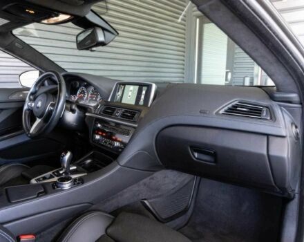 Черный БМВ М6, объемом двигателя 4.4 л и пробегом 77 тыс. км за 20500 $, фото 6 на Automoto.ua