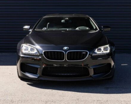 Черный БМВ М6, объемом двигателя 4.4 л и пробегом 77 тыс. км за 20500 $, фото 1 на Automoto.ua