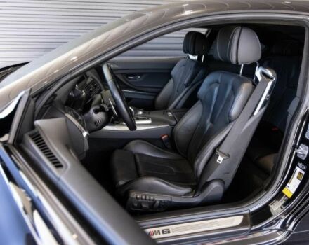 Черный БМВ М6, объемом двигателя 4.4 л и пробегом 77 тыс. км за 20500 $, фото 7 на Automoto.ua