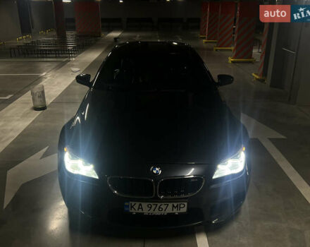 Серый БМВ М6, объемом двигателя 4.39 л и пробегом 102 тыс. км за 39000 $, фото 2 на Automoto.ua