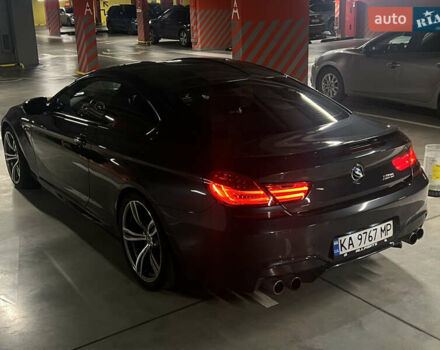 Серый БМВ М6, объемом двигателя 4.39 л и пробегом 102 тыс. км за 39000 $, фото 6 на Automoto.ua